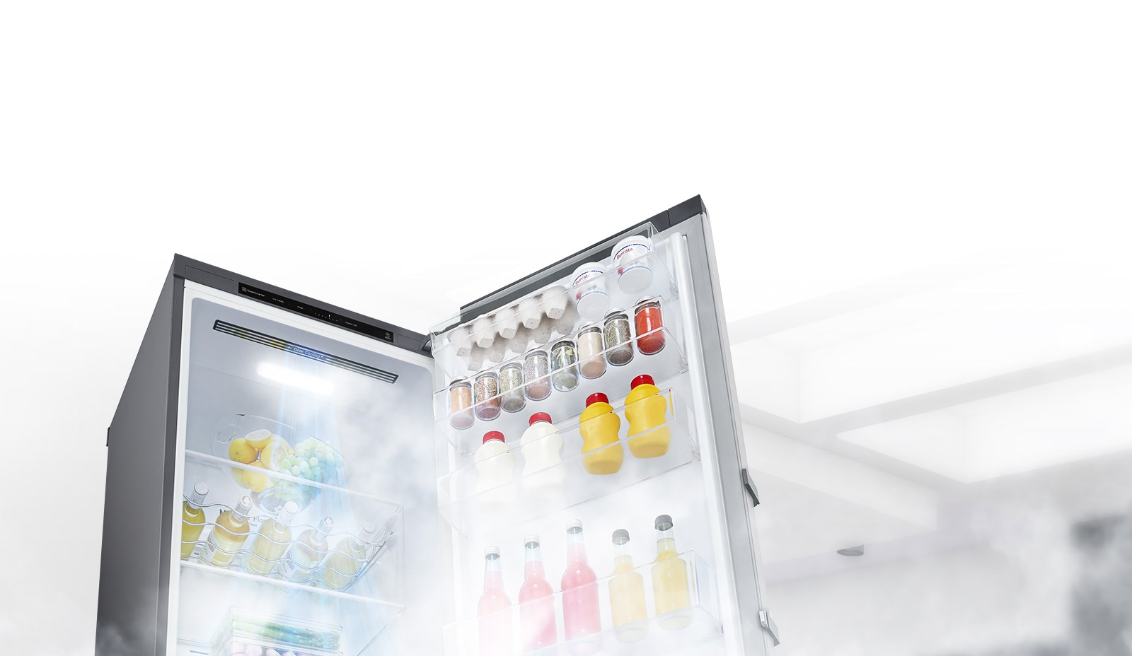 The refrigerator is shown open at an angle and filled with produce. White air is blowing from the top of the interior down around all of the food to keep it cool.