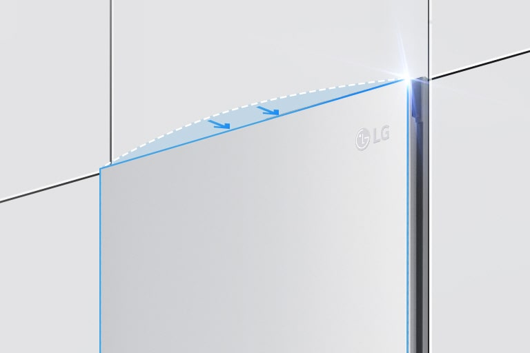 The top of the refrigerator is shown at an angle with two arrows pointing in toward the wall at the top edge indicating the refrigerator is flush with the cabinets surrounding it.