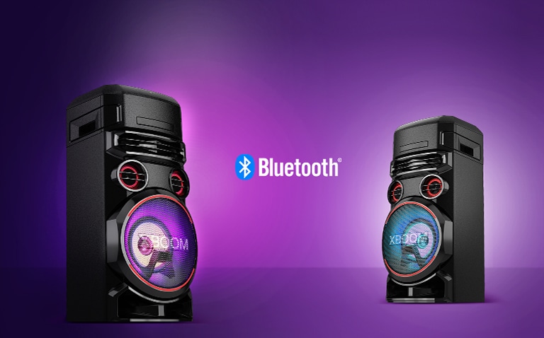 Two LG XBOOMs facing each other at diagonal angles against a purple background with a Bluetooth logo in between.