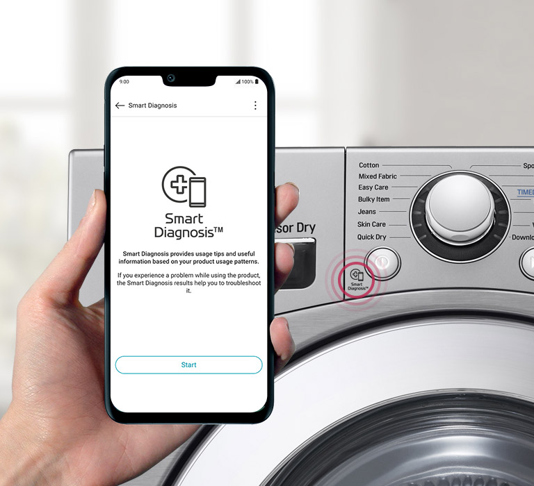 A hand holds a smart phone in the forefront with the Smart Diagnosis app open and cycles through the pages on the app showing issues and alerts for the dryer sitting in the background.